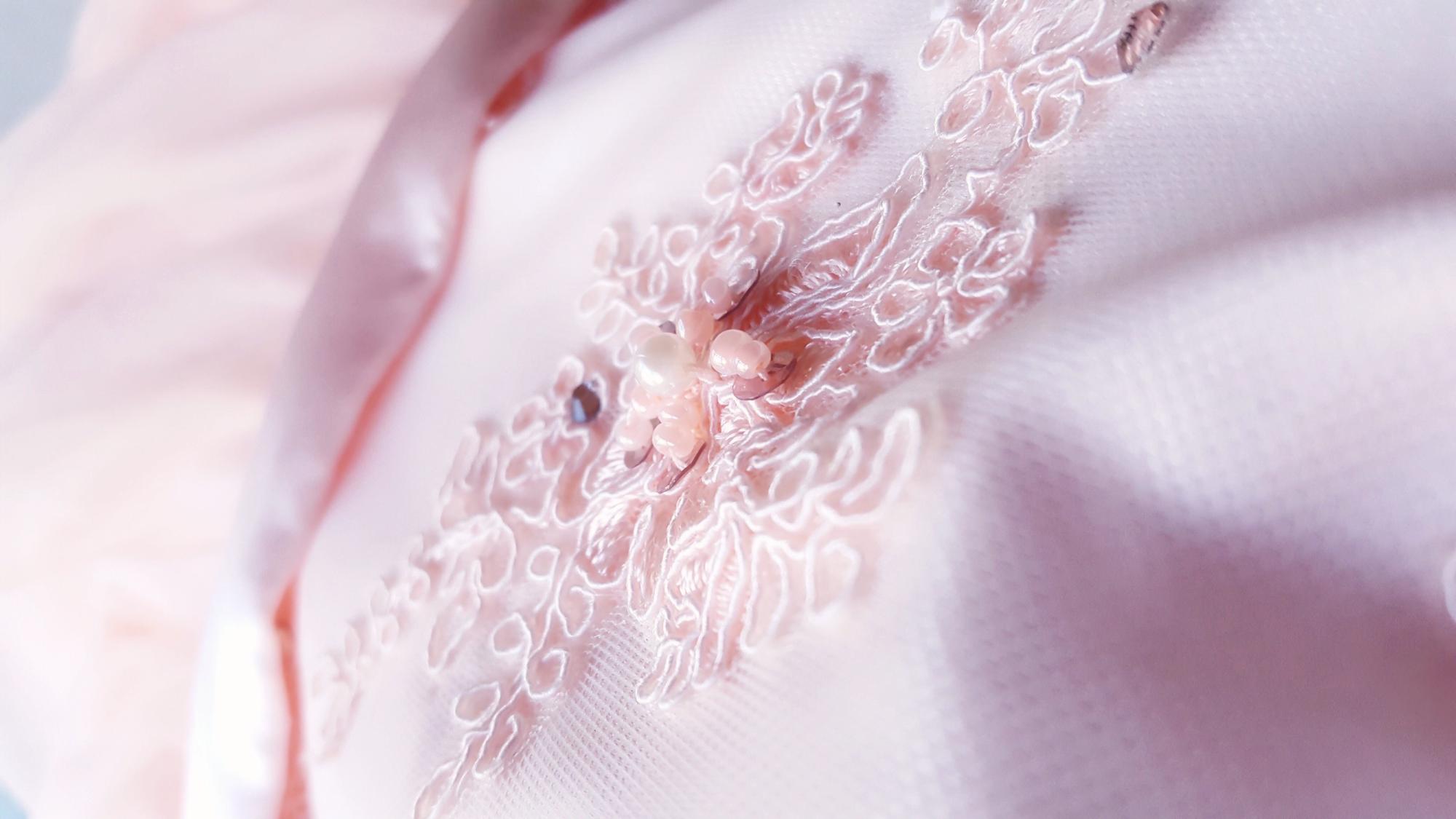 Close-up floral satin stitch